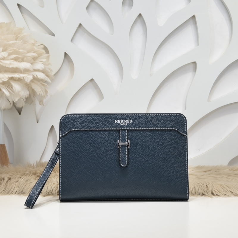 H**mes clutch bags